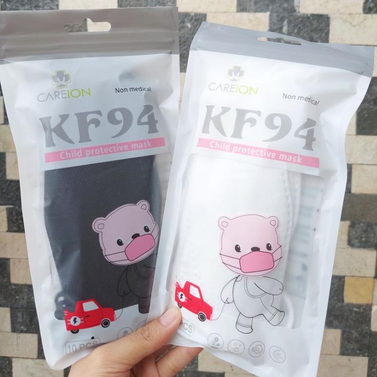 メ MASKER KF94 CAREION ANAK MERK CAREION KIDS POLOS 4PLY HITAM DAN PUTIH 3-12 TH - ISI 10 PC •