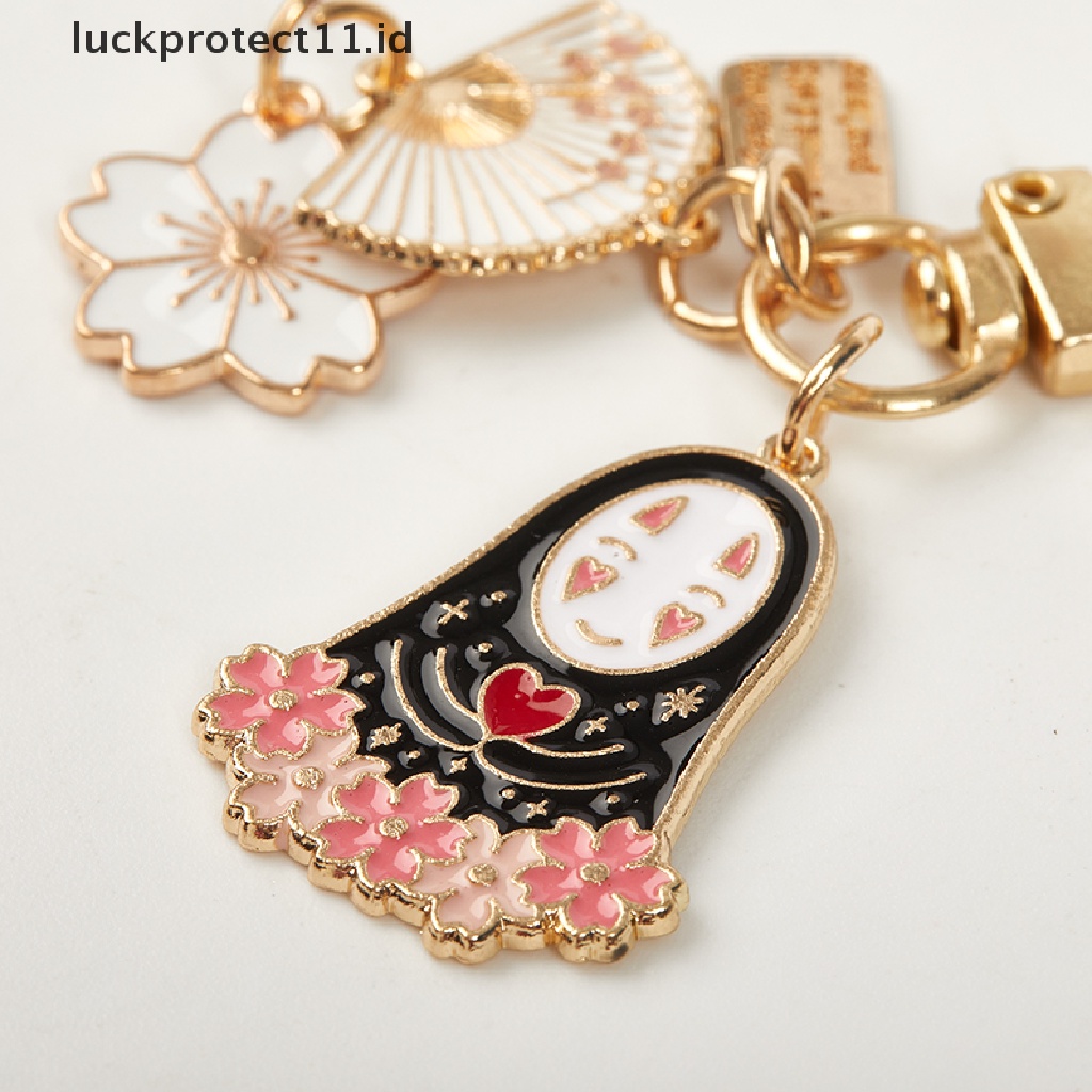 /Fashion Hot// Fashion// Kartun Tanpa Wajah Laki-Laki Gantungan Kunci Wanita Logam Bunga Sakura Key Chain Hadiah Perhiasan.