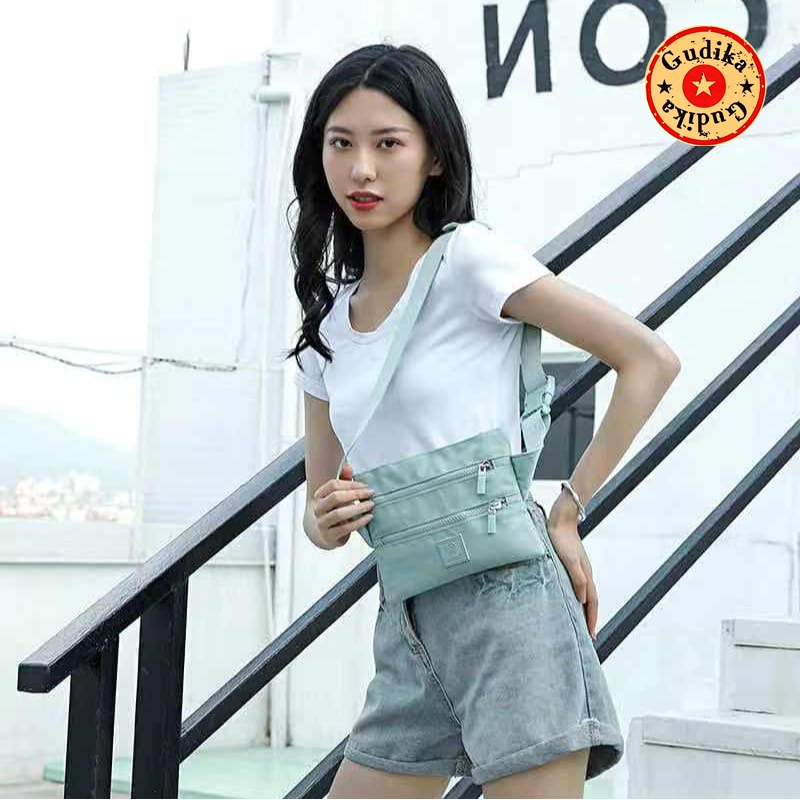 BIG PROMO  GUDIKA 5198 - Tas Waistbag Wanita Kekinian Import Original Terbaru Bahan Nilon Waterproof Anti Air Sling Bag Premium Korea bisa muat banyak barang banyak slot kocek terlaris - tas wanita - tas cewek - tas kerja - tas pinggang - gudika bag