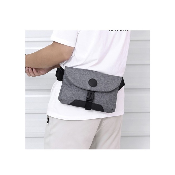 TAS SLING PRIA/WAIST BAG PRIA MODIS DAN BARU AMAN DARI MALING