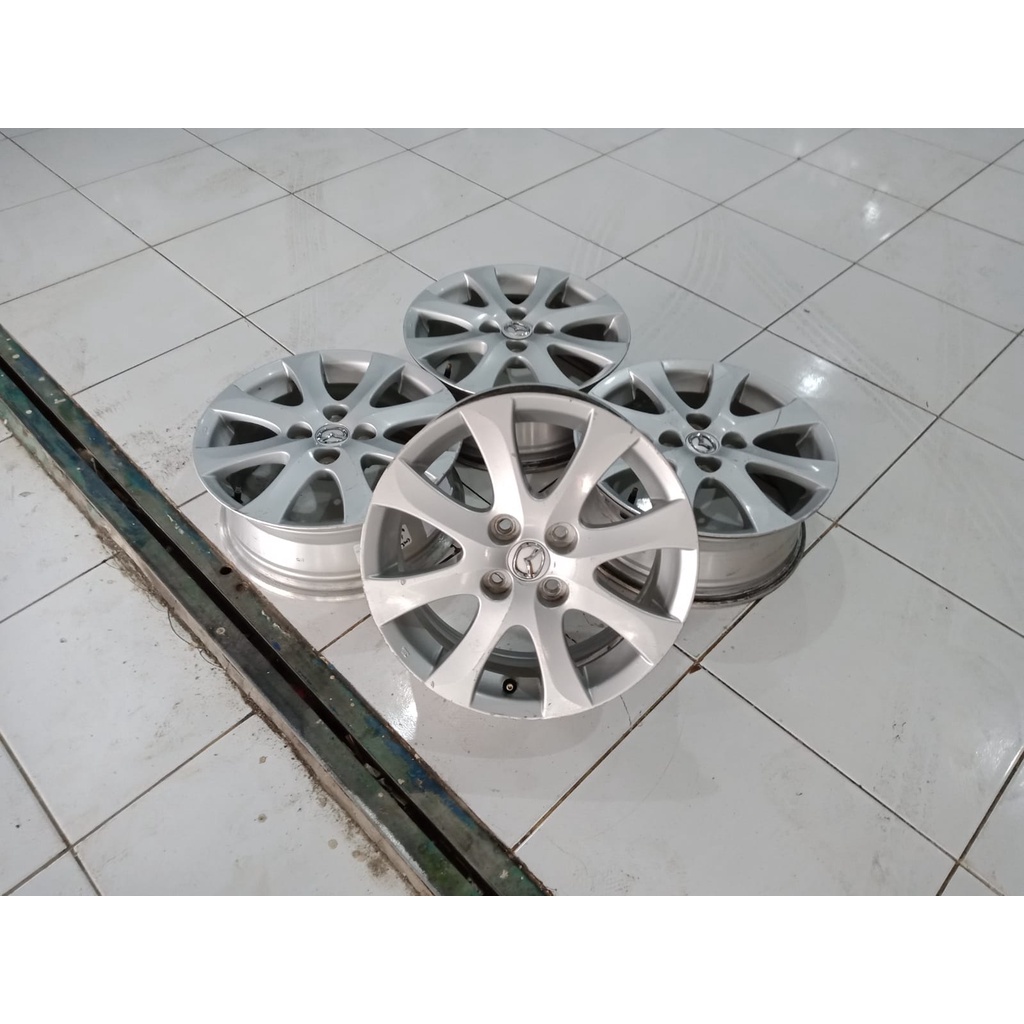 1 set pelek bekas mobil oem mazda2 ring 15 pcd 4x100 silver