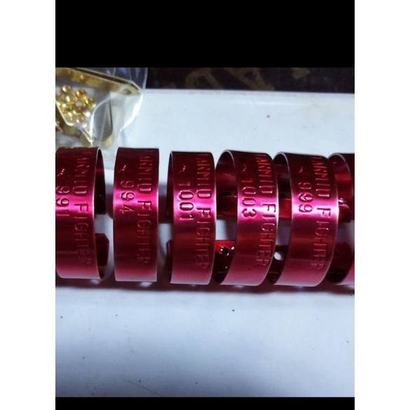 gelang kaki ayam warna merah, harga per 12 pcs,