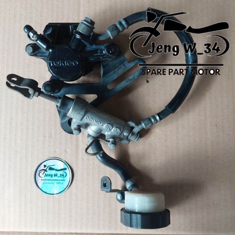 CAKRAM BELAKANG MASTER KALIPER KEPALA BABI SATRIA FU 150 INJEKSI PNP SATRIA FU 150 KARBU ORIGINAL