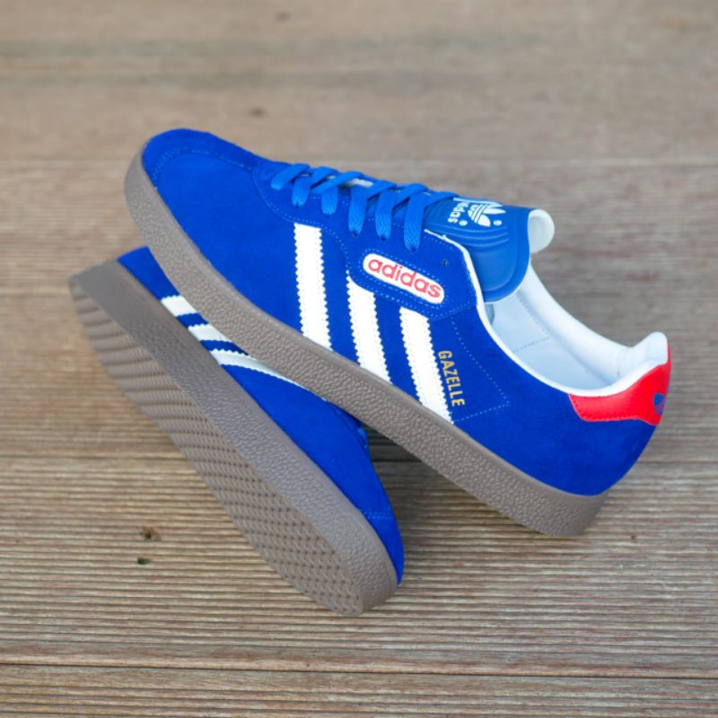 Sepatu Adidas Gazelle biru Lis putih sol gum