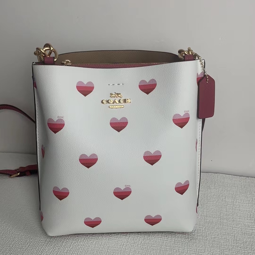 TAS WOMEN WANITA MOLLIE BUCKET BAG 22 WITH STRIPE HEART PRINT CA249