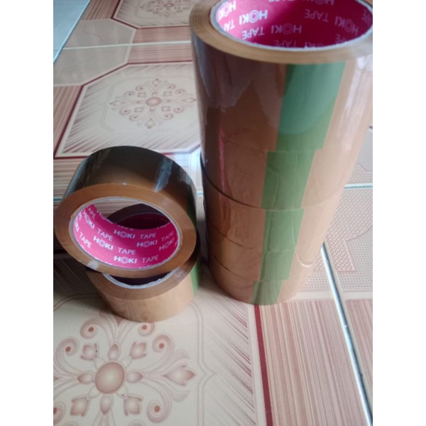 

Lakban 45mm×100 yard coklat Supreme kualitas rekat kuat ,merk HOKI