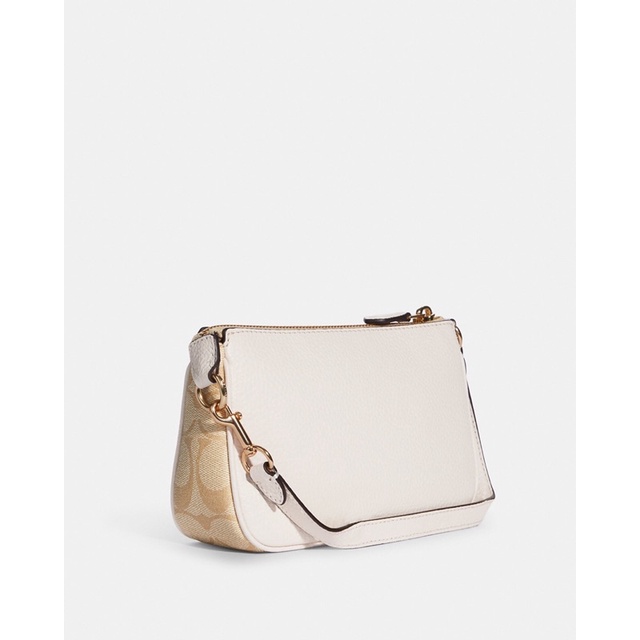 Coach Nolita 19 In Signature Canvas With Floral Whipstitch (C9924)