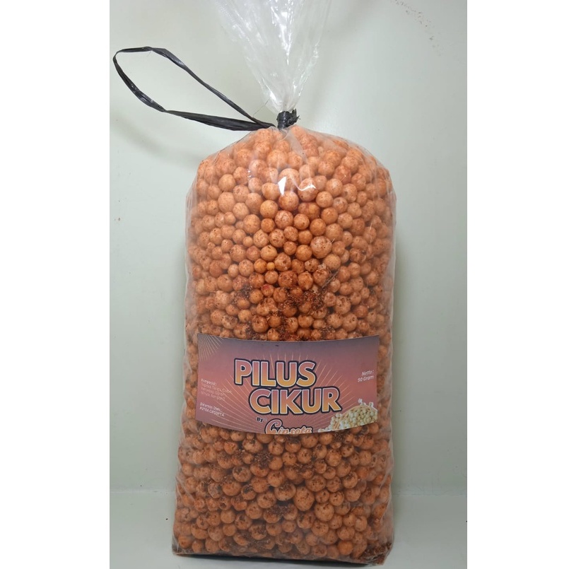 

Pilus cikur pedas daun jeruk 1 kg / Pilus Kencur pedas daun jeruk/ Makanan Ringan / Pilus cikur pedas daun jeruk 100 gr cisopta snack