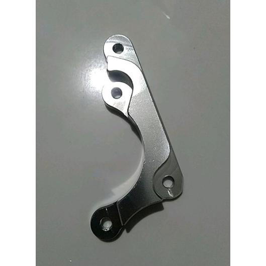 PRODUK- BREKET KALIPER 2P 2PISTON NISSIN BREMBO WAVE125/110 SUPRA X 110,125 SUPRA FIT/ NEW KHARISMA 