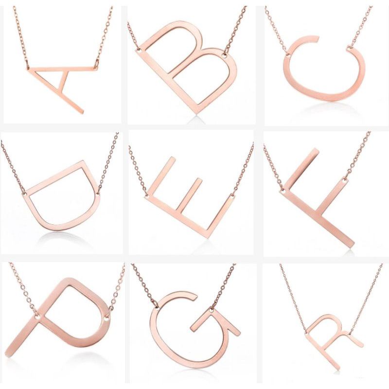 KALUNG TITANIUM INISIAL ALPHABET WARNA ROSE GLOD