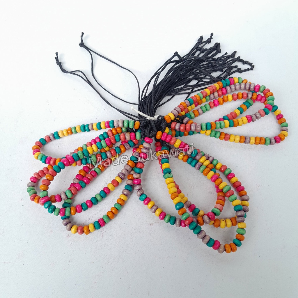 Gelang tali bola kayu