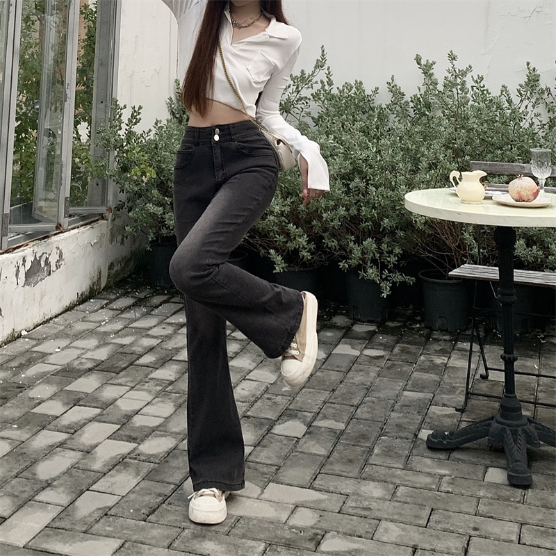 Celana jeans melebar pinggang tinggi high-waist hamparan luas leg denim kasual berkobar celana wanita Korea