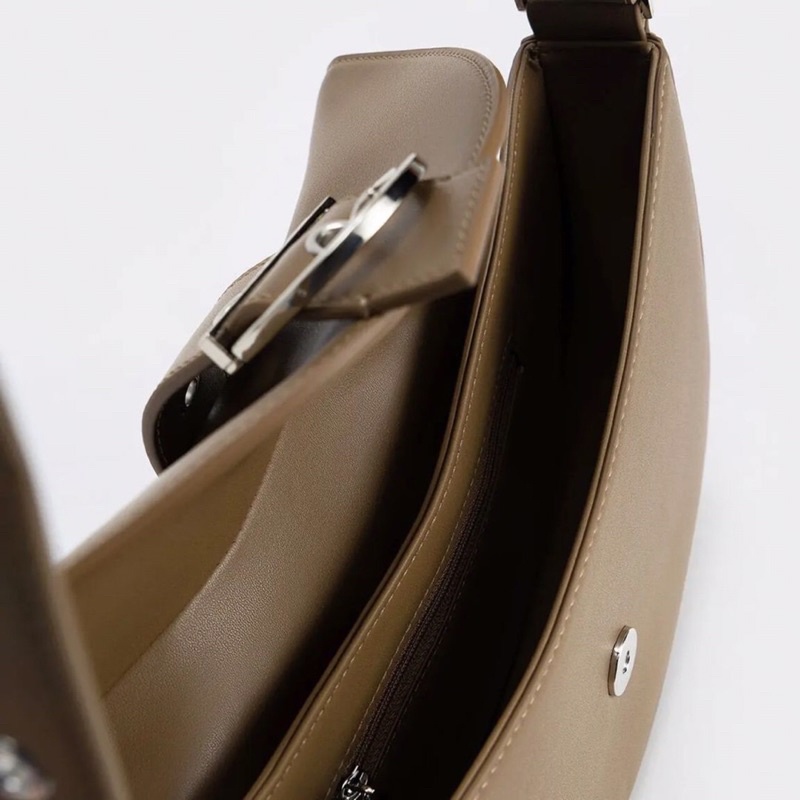C buckled strap crescent