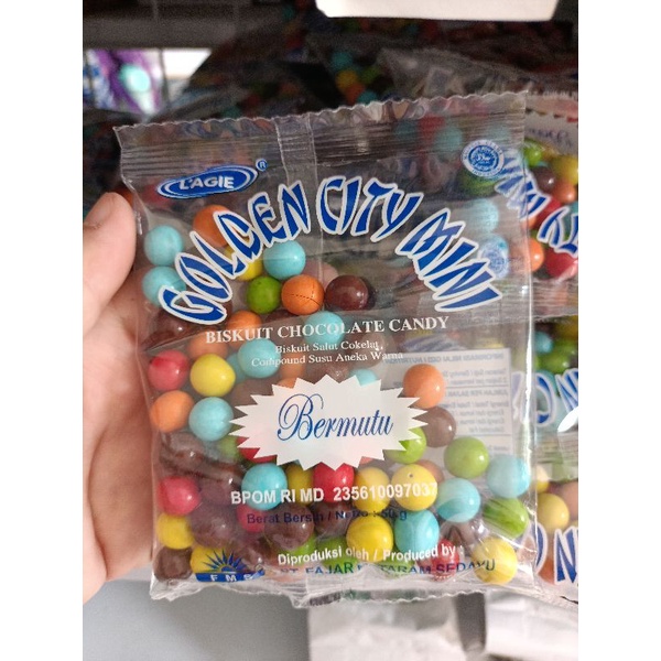 

Golden City Coklat Ball WARNA WARNI isi Biscuit 75Gr