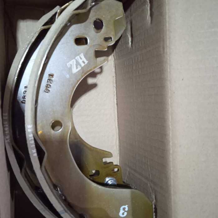 kampas rem belakang grand livina brake shoe Original