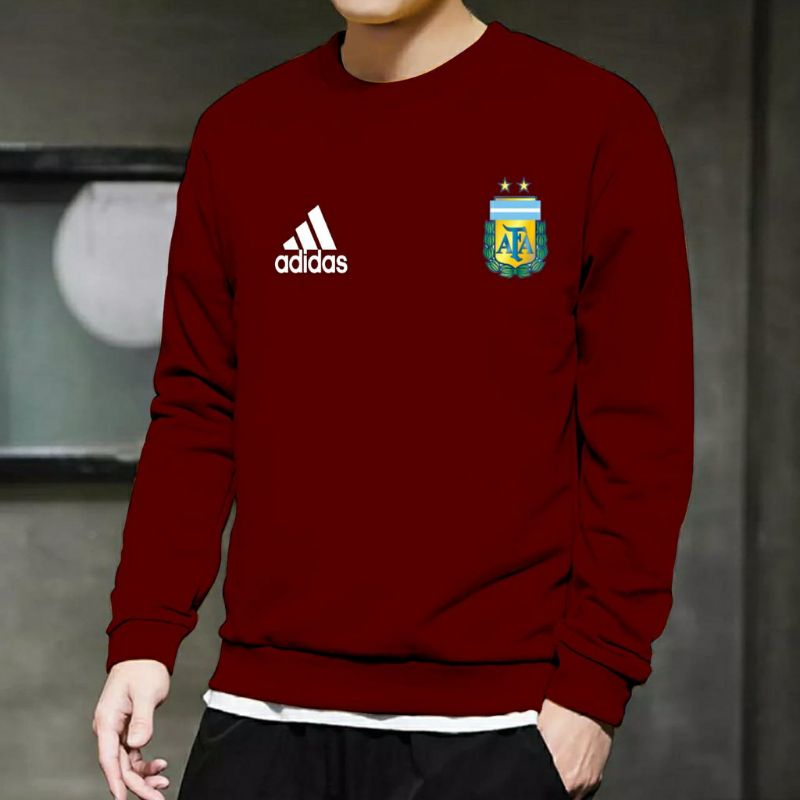 fashiontrend sweater unisex logo bola lengan panjang buat pria dan wanitaada4ukuranhitam,kuning,coks