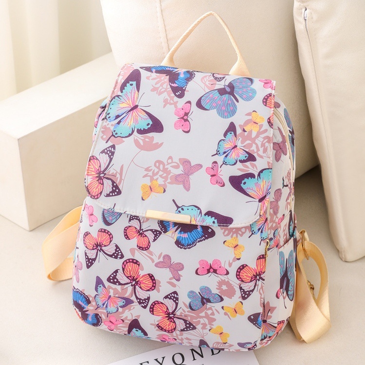 TAS RANSEL WANITA BACKPACK NILON MOTIF KUPU-KUPU CALENIA TA721M4 IMPORT GENDONG PUNGGUNG SEKOLAH KOREA LUCU KERJA KULIAH BESAR BRANDED BATAM REMAJA CEWEK MURAH PREMIUM BATAM KEKINIAN