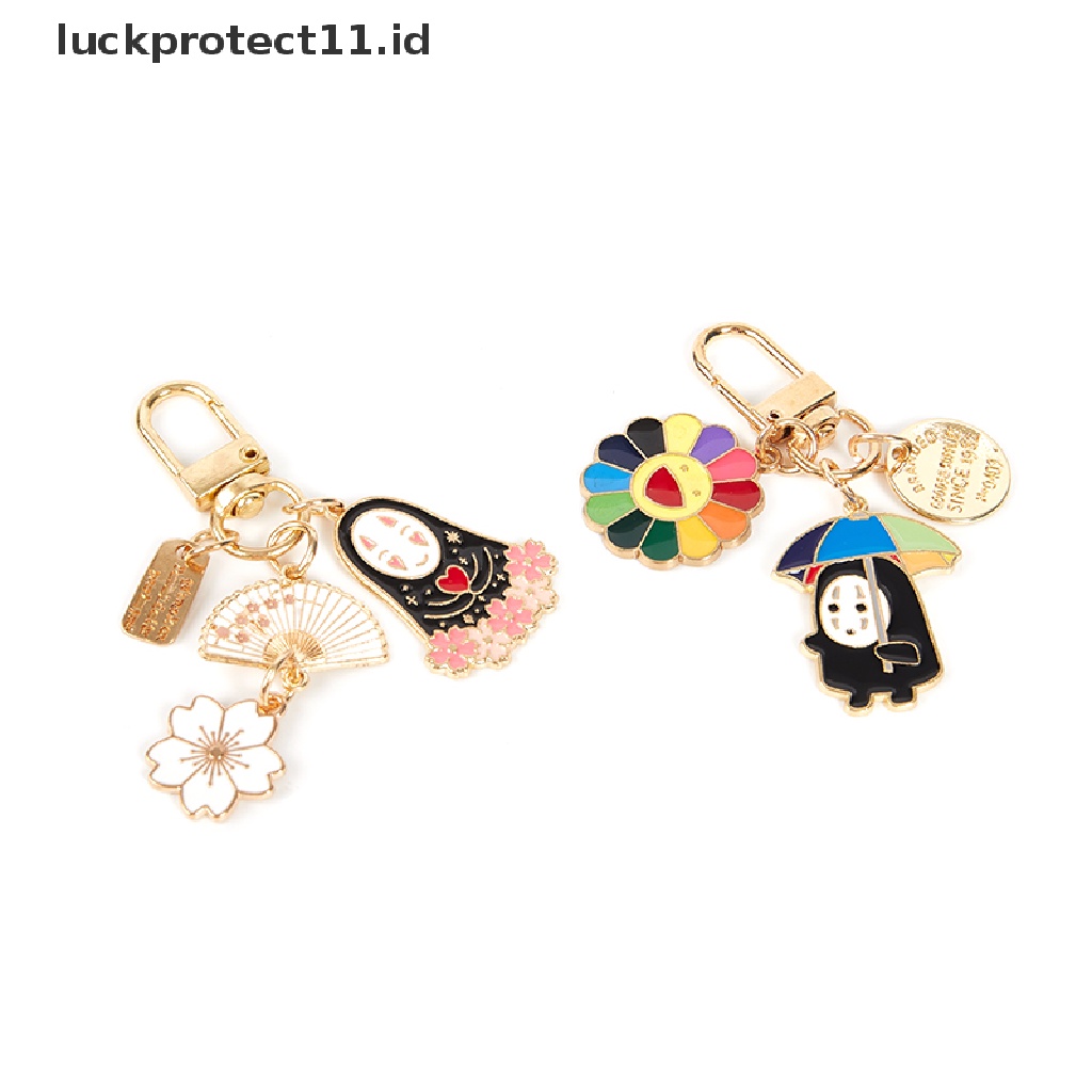 /Fashion Hot// Fashion// Kartun Tanpa Wajah Laki-Laki Gantungan Kunci Wanita Logam Bunga Sakura Key Chain Hadiah Perhiasan.