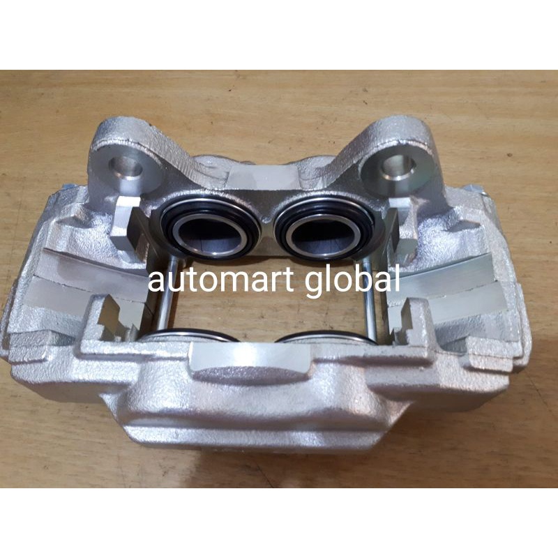 caliper assy depan Hilux Revo ok300