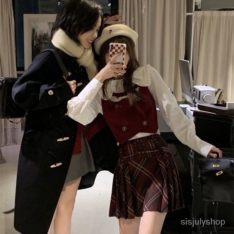 Boneka kerah peplum pinggang kemeja putih rompi dua potong gaya kuliah vintage