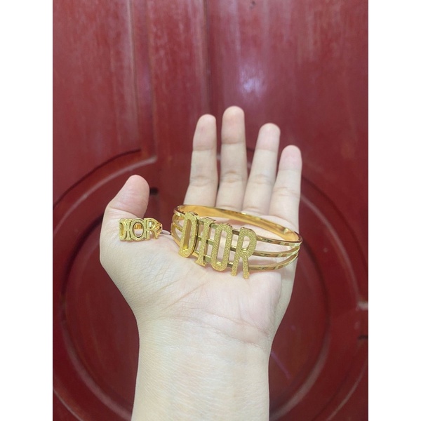 gelang dan cincin titanium Dior