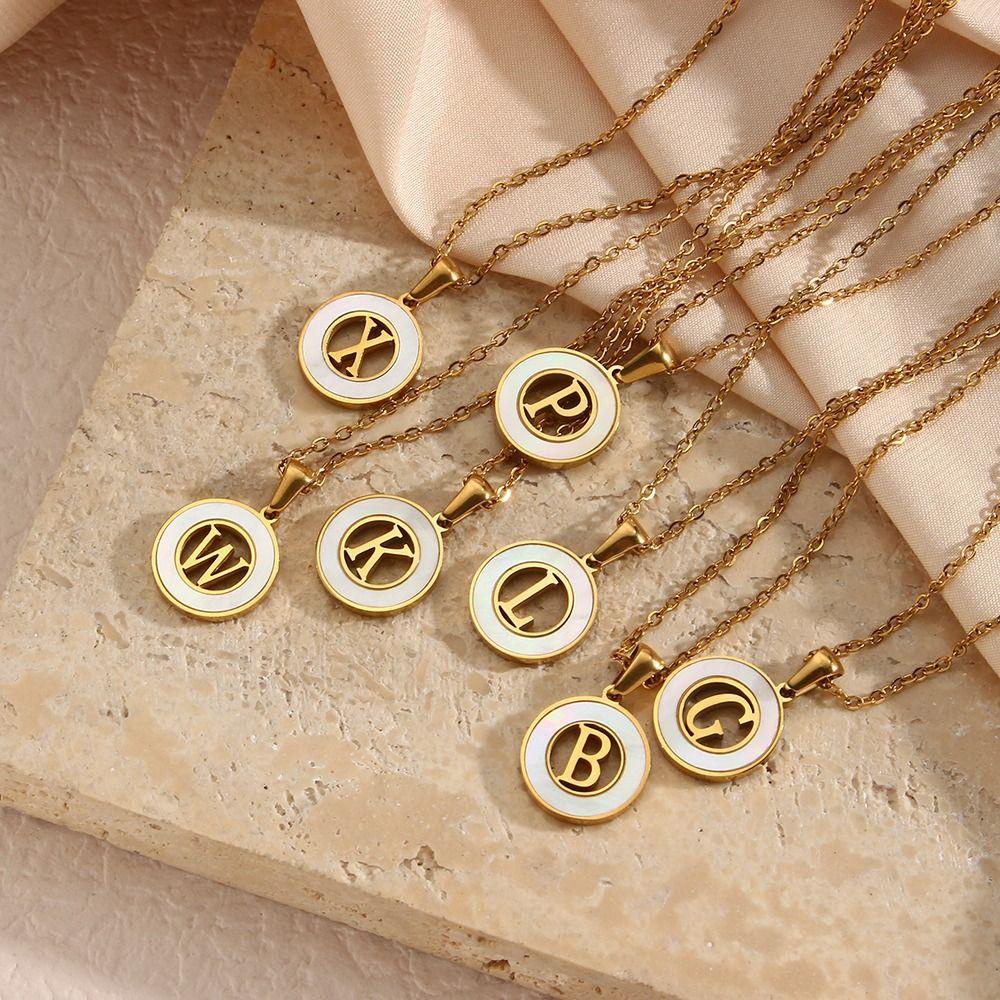 Mxbeauty Wanita Shell Kalung Trendi Pesona Unik 26huruf Liontin Hollow Stainless Steel Desain Niche Rantai Sweater Bulat Kecil