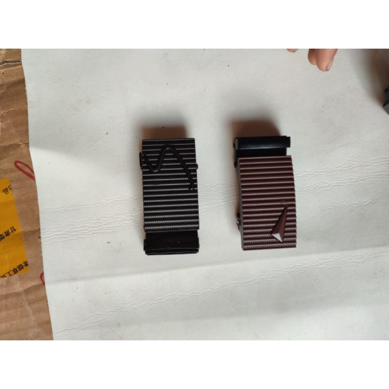 kepala ikat pinggang model rell warna
