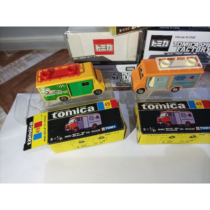 Tomica Diecast scale model S=1/81 Isuzu Elf Hi-Hi-Roof no 49 Japan Black Box Color Yellow and Orange