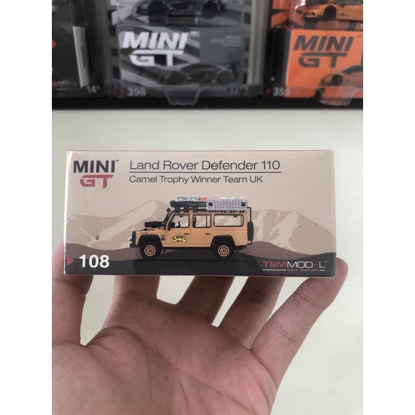 Diecast 1:64 MGT 108 Mini GT Land Rover Defender 110 - Camel Trophy Clean