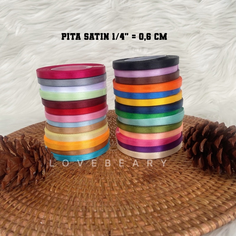 PITA SATIN 1/4” = 0,6 CM PANJANG 20-25 YARD