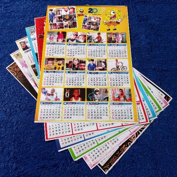 

Kalender custom foto atau logo 1 lembar ukuran standard bisa pesan 1 pcs dan banyak
