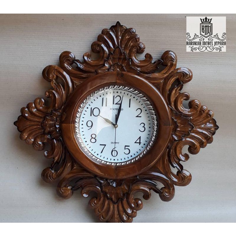 Jam dinding ukir kayu jati