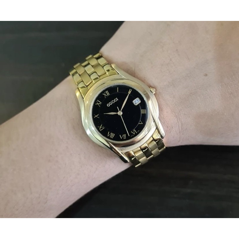 gucci gold watch