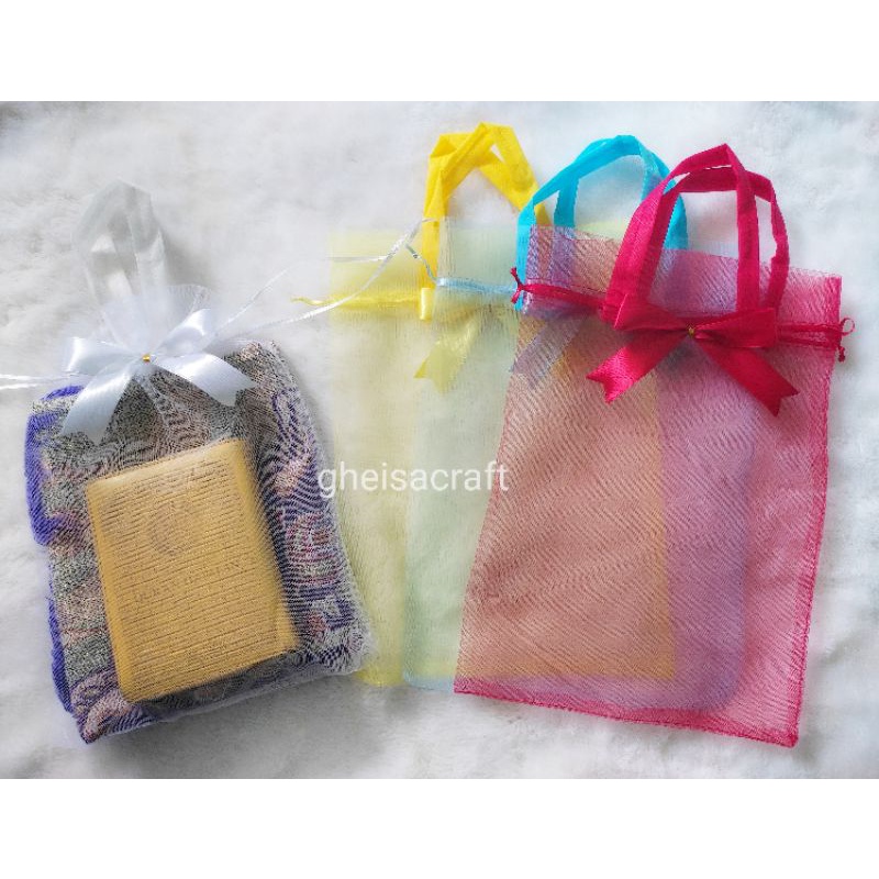

TAS TILE SERUT SOUVENIR SAJADAH UKURAN 25X30CM