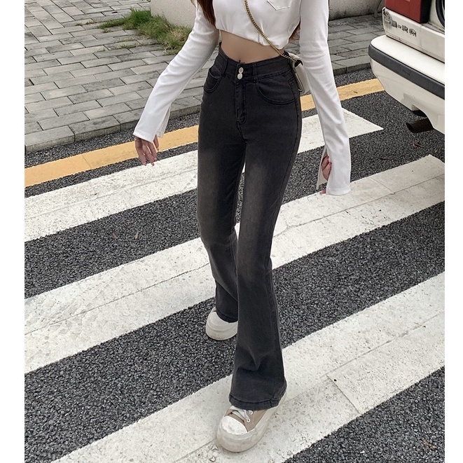 Celana jeans melebar pinggang tinggi high-waist hamparan luas leg denim kasual berkobar celana wanita Korea