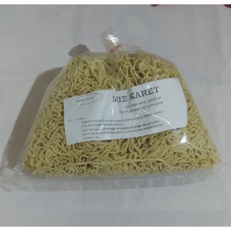 

MIE MENTAH MIE KARET KERITING TELUR AYAM 1 BUNGKUS ISI 5 PCS