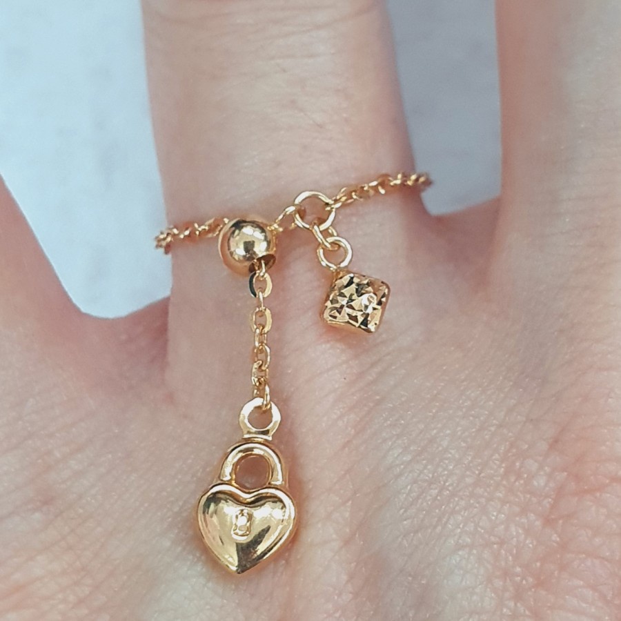 cincin millie molly serut gembok emas 70 % 700 70 % variasi bunga