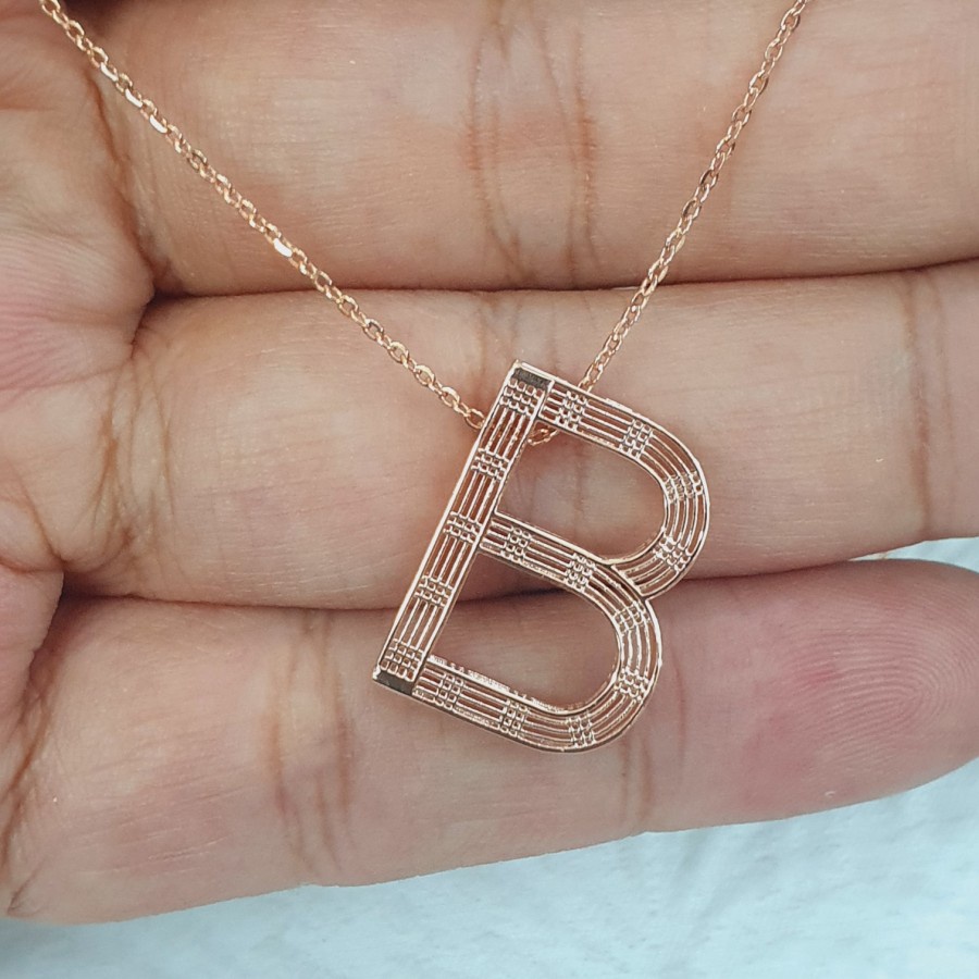 kalung siem huruf B variasi rose ad mata emas 75% 750 75 % 17k