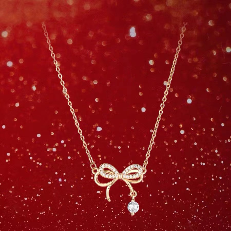 French Smart Bow Dikombinasikan Dengan Alloy Kalung Wanita Penjahat Mewah Ringan High Sense level Musim Gugur Dan Dingin Sweater Rantai Hadiah Ulang Tahun