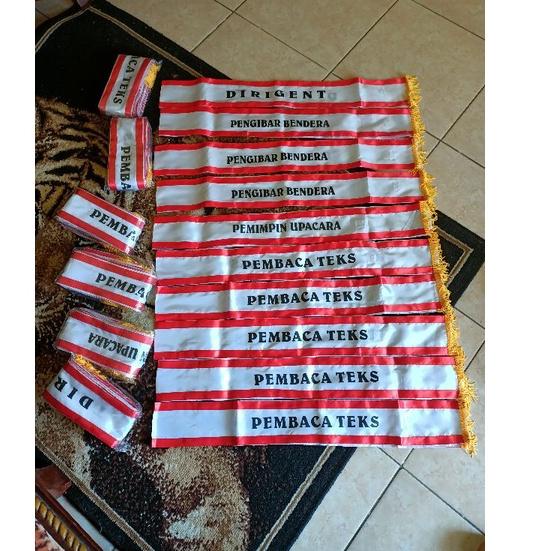 

Hot Product Map Slempang Petugas Upacara Batik Murah. 1 set isi 5 map 10 slempang lengkap