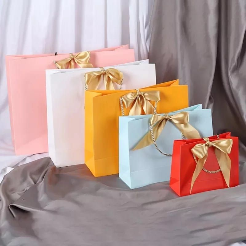 

Kantong/Paperbag polos dengan pita 6 warna