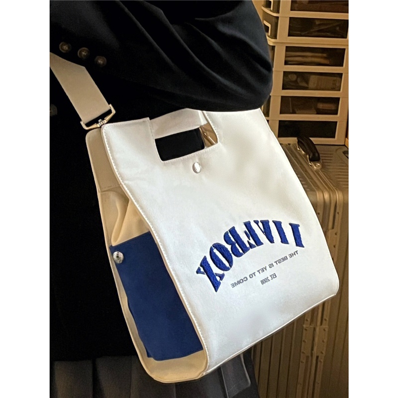 ﺴ♟♞Sera College Style Messenger Bag Wanita 2022 Kasual Baru Jepang Komuter Tas Bahu Siswa Kelas Portabel Tas Kanvas