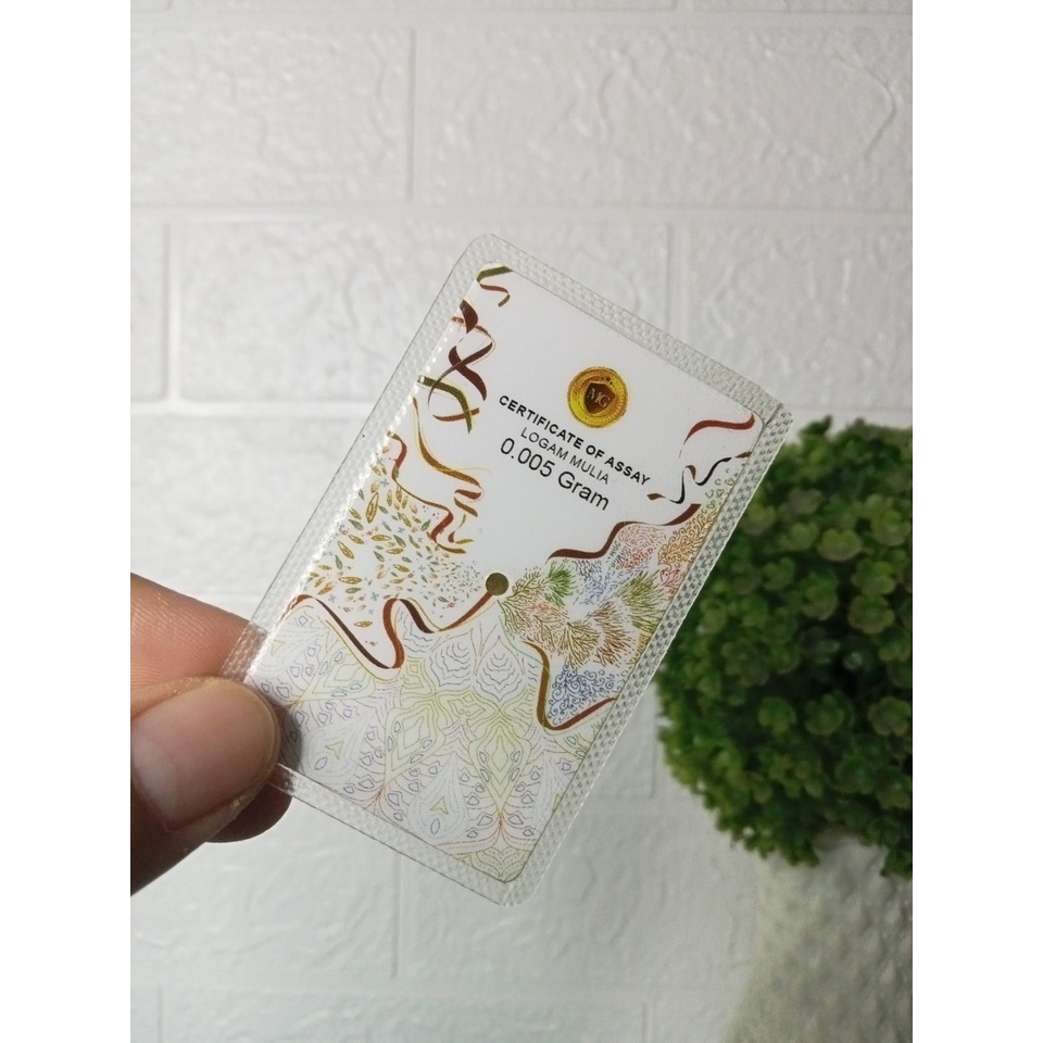 MINIGOLD Reguler Souvenir Series 0.005 Gram Kemasan Laminating TERMURAH TERLARIS Emas Mini Emas Batangan Logam Mulia Murni 24 Karat Bersertifikat Resmi Asli Original Tabungan Emas Souvenir Keren Mewah