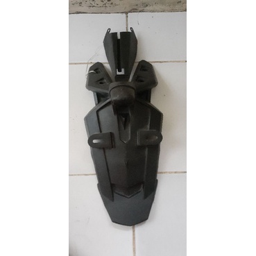 spakbor belakang mx king 150