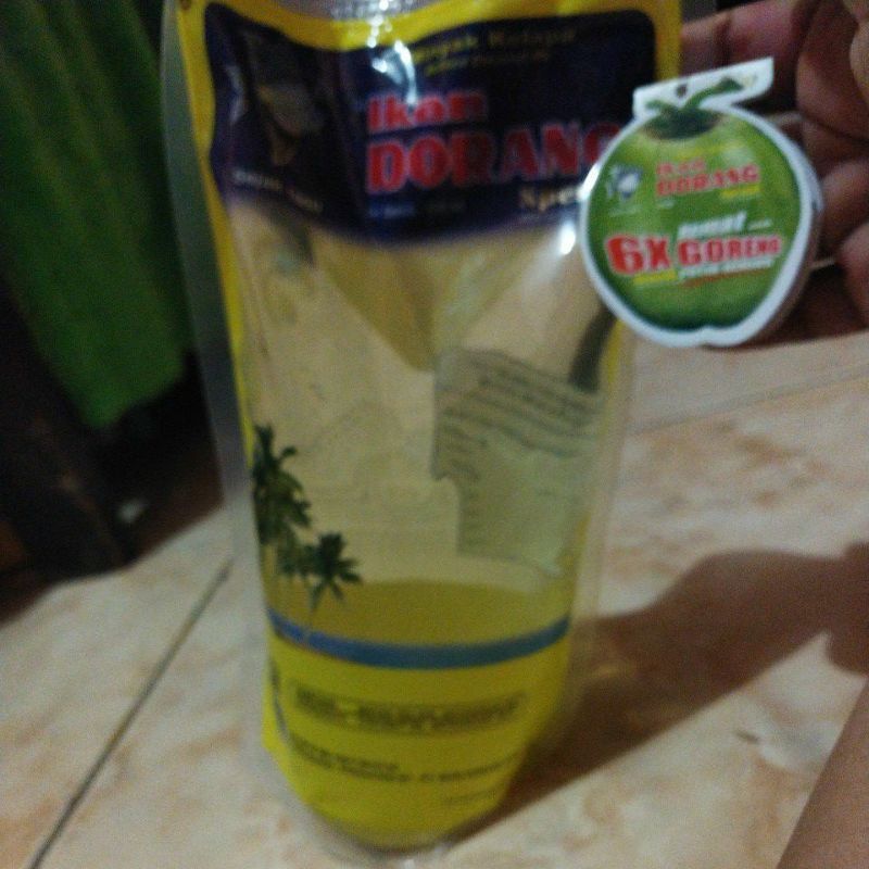 

Minyak kelapa cap ikan dorang isi 950ml