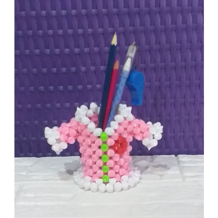 

Tempat pensil baju dari mote