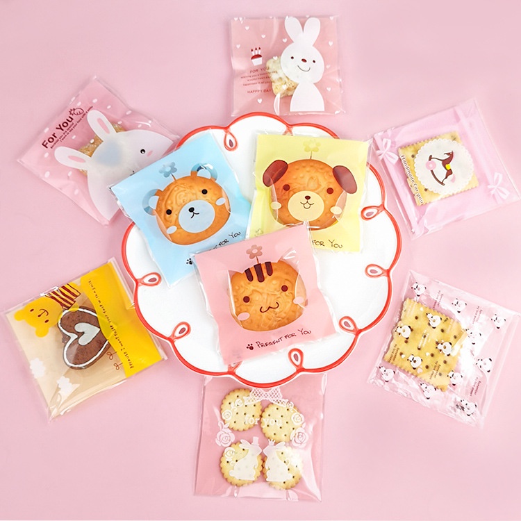 

RK plastik cookies uk 10x10 cm sudah ada lem/ plastik kue kemasan motif kartun/ plastik opp kemasan