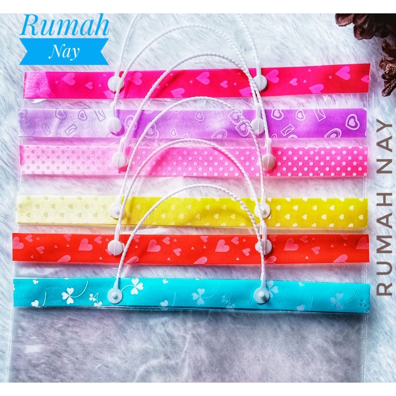 

Plastik Pita Motif Goodiebag Bingkisan Gamper Bingkisan Serbaguna size 20x25