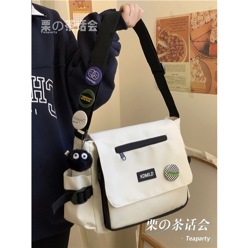 ♤๑Sera Japanese simple all-match Messenger bag female student commuting to class large-capacity shoulder bag postman bag male