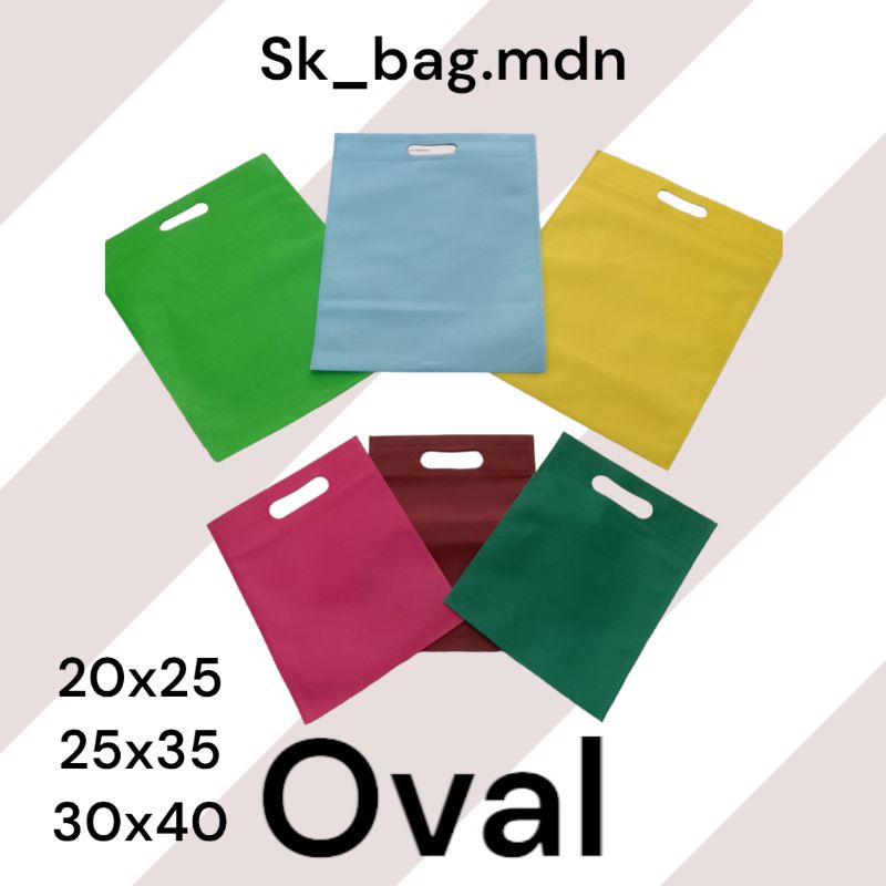 

Tas Spunbond Goodiebag / tas kain / tas souvenir OVAL 30X40 isi 20 pcs tebal premium 75gsm